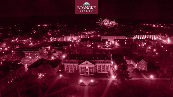 A photo of the Roanoke College campus from the air that is in a Maroon filter